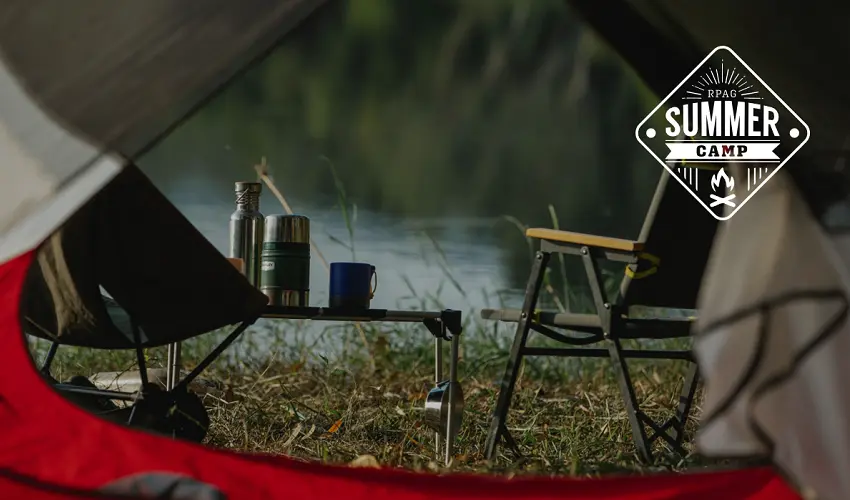 Camp RPAG Camping Chair facing a lake