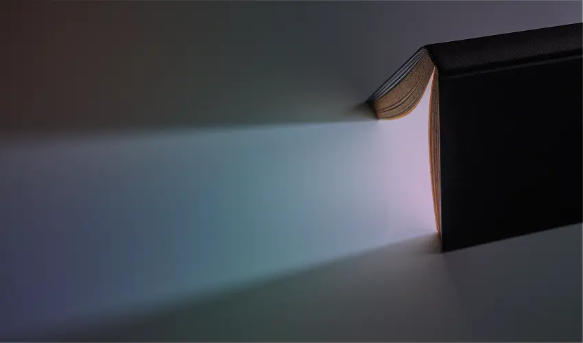 Open book with light projecting out